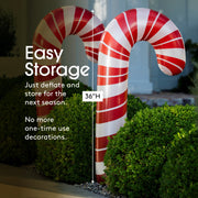 Inflatable candy cane decoration with text on easy storage.